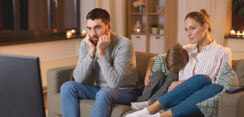 Image of a family bored watching TV, CTV, BVOD, AVOD or SVOD