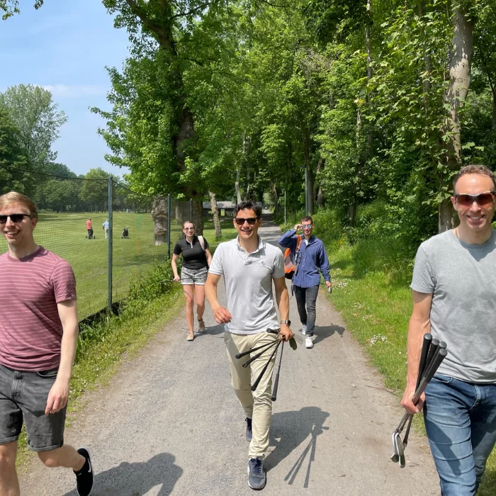 Photo of the Beatgrid team going to play golf