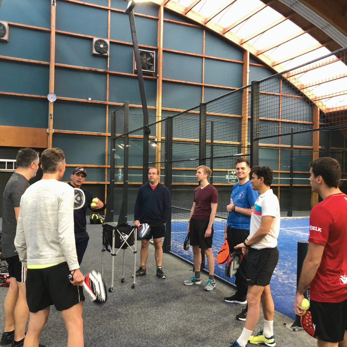 Beatgrid Team playing padel on a business team building activity